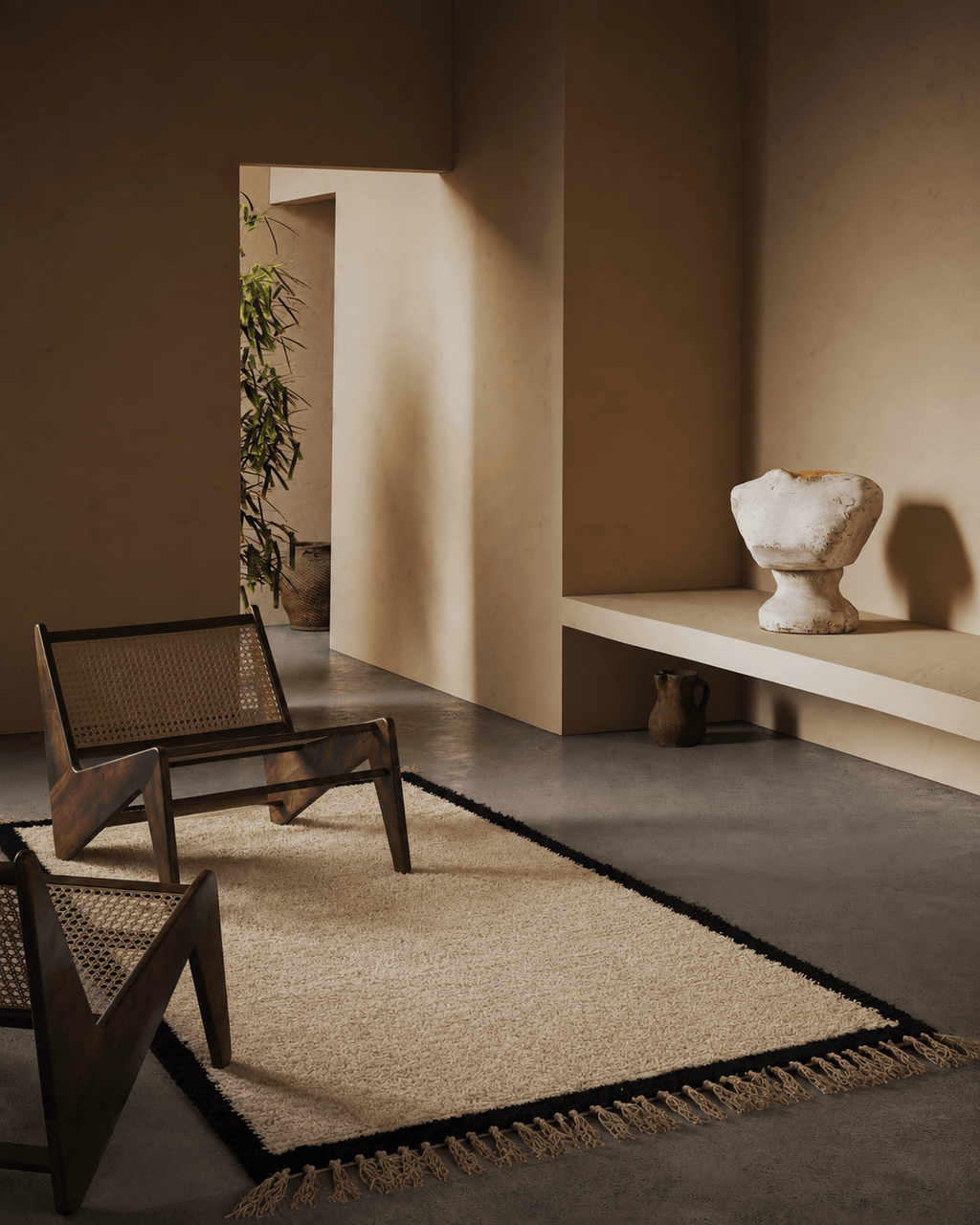 Handmade cream Berber wool rug with black border in a minimalist modern interior